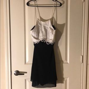 Black and white laced mini dress